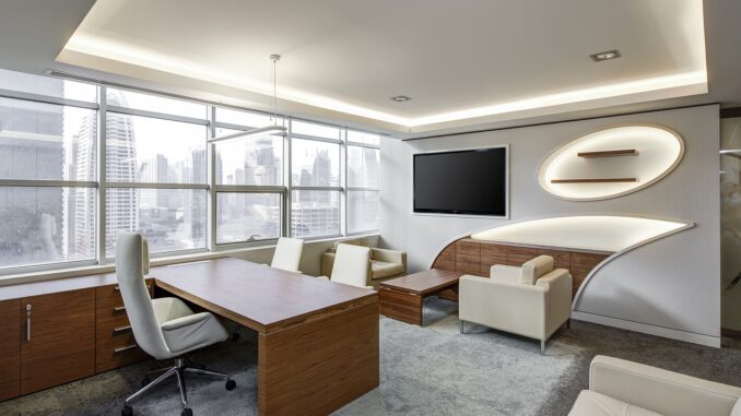 Empty executive office with desk and chair, illustrating reasons to fire your recruiter Empty executive office with desk and chair, illustrating reasons to fire your recruiter