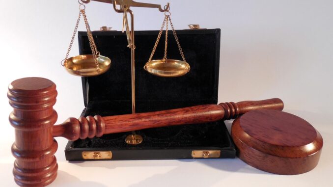 Empty courtroom podium where a lawyer might invoke the Fifth Amendment