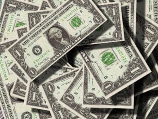 Pile of dollar bills: Fox general counsel and chief legal officer pay, $12.6M cash-out