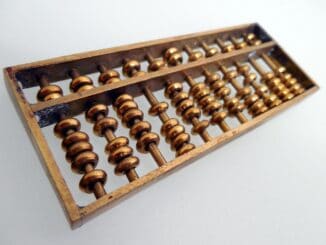 Wooden abacus for general counsel CFO budget talks