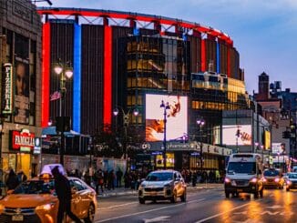 Madison Square Garden arena exterior, tied to a general counsel compensation disclosure
