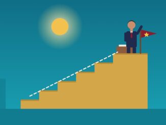 How to become a general counsel: a lawyer at the top of a staircase beside a flag
