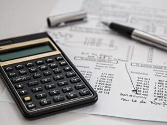 Calculator on legal documents, tallying in-house lawyer fees